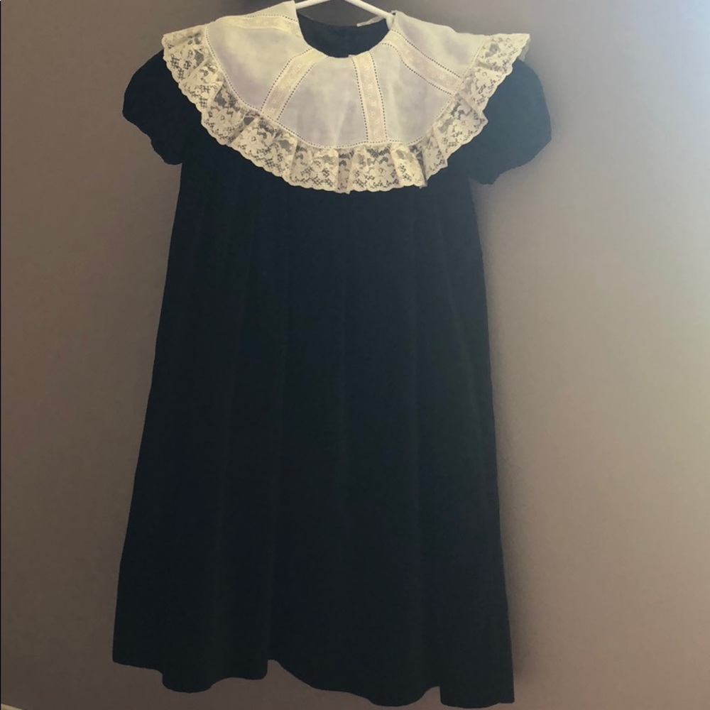 Black velvet dress with detail on collar.